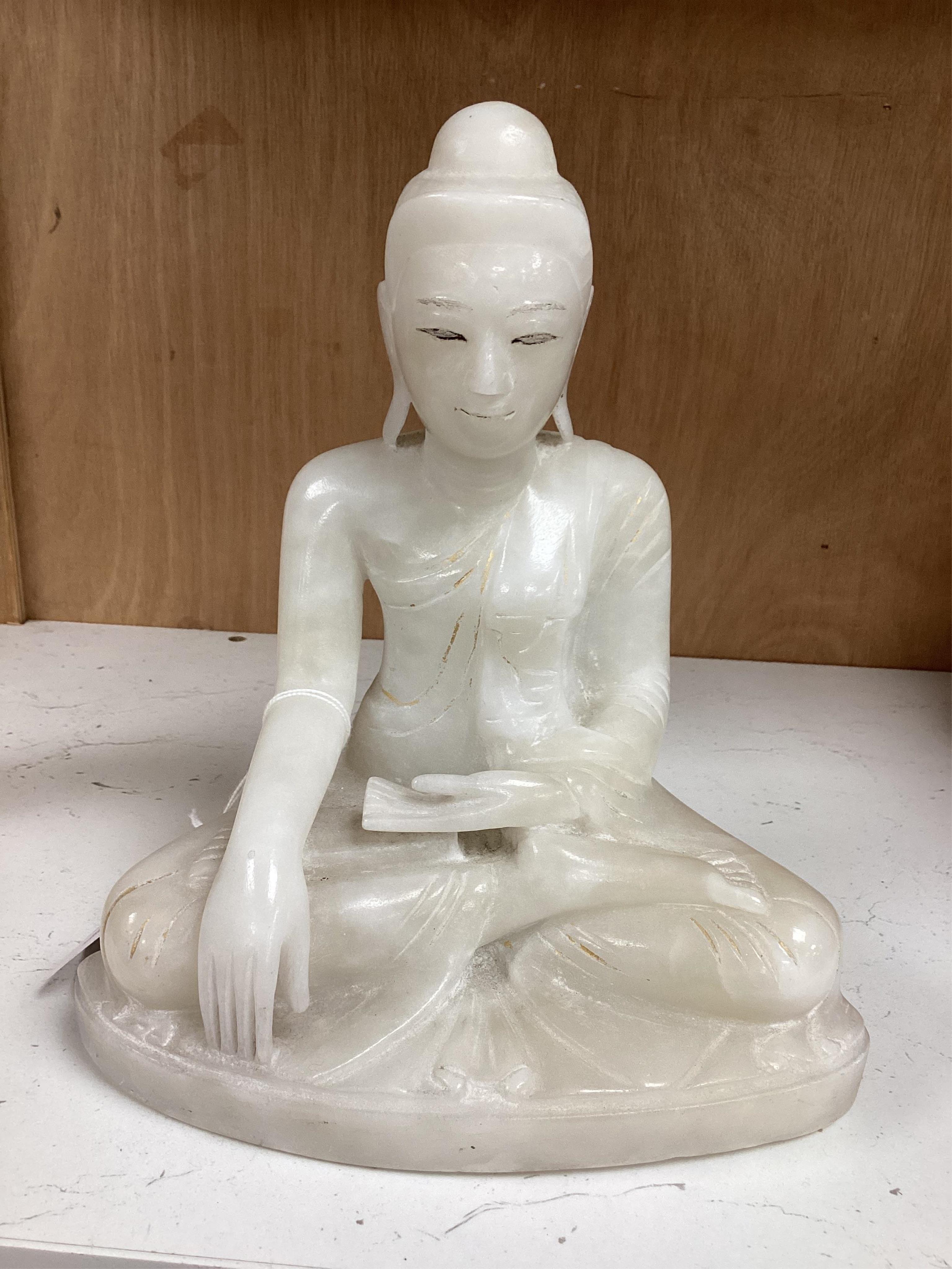 Two modern jade figures, together with a marble Buddha and a carved giltwood figure, largest 24cm wide